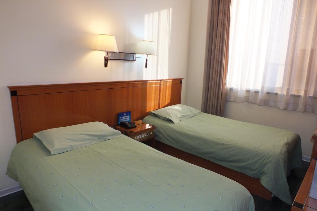 Beijing Fuxing Holiday Hotel Kamer foto